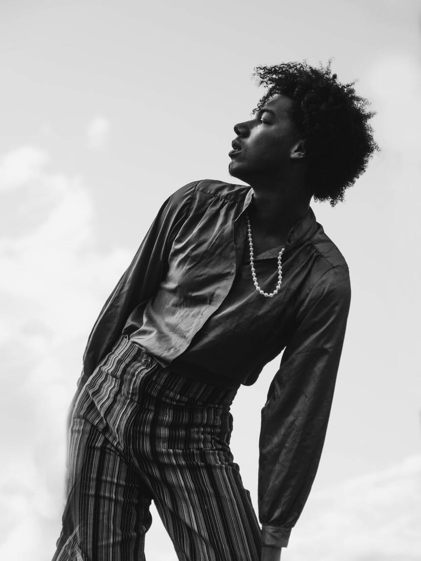 A Side View of Male Model in Black and White